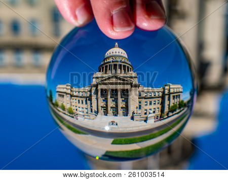 An Image Of The Idaho State Captial As Seen Through A Lens Ball.