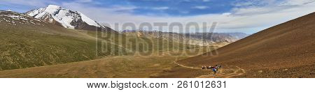 Beautiful Colorful Panoramic Landscape With Kang Yatze Mountain And A Donkey Caravan Taken From Unde
