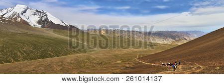 Beautiful Colorful Panoramic Landscape With Kang Yatze Mountain And A Donkey Caravan Taken From Unde