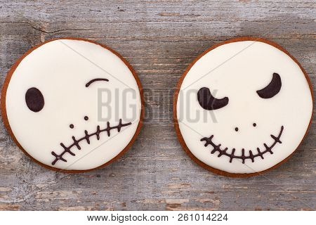 Halloween Gingerbread Cookies On Wooden Background. Jack Skellington Sugar Cookies.