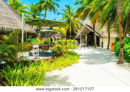 Lhaviyani Atoll, Maldives - 8 July 2018: Territory Of A Luxury Hotel In Tropical Plants And Trees, O