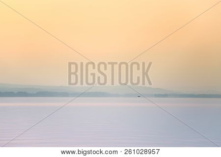A Dreamy, Hazy Landscape Of A Mountains Close To Sunset. Sun Flase And Misty Look In Blue Tones. Mo