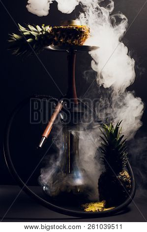 Hookah Hot Coals On Shisha Bowl With Black Background. Stylish Oriental Shisha. Pineapple