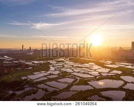 Skyline of Shenzhen City, China at twilight. Viewed from Hong Kong border
