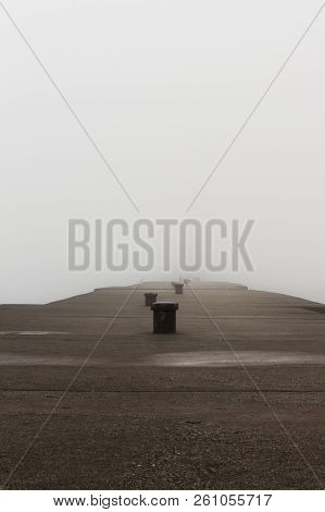A Pier On Lake Michigan Obscured By Thick Fog.  Sheboygan, Wisconsin, Usa.