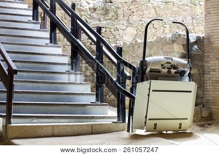 Stairlift For Disabled And Elderly People To Climb Stairs At Archaeological Site. Archaelogy And Dis