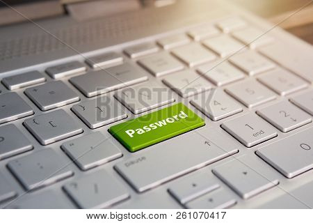 Green Key With Stop Palm Icon Symbol On Laptop Keyboard. Color Button On The Gray Silver Keyboard Of