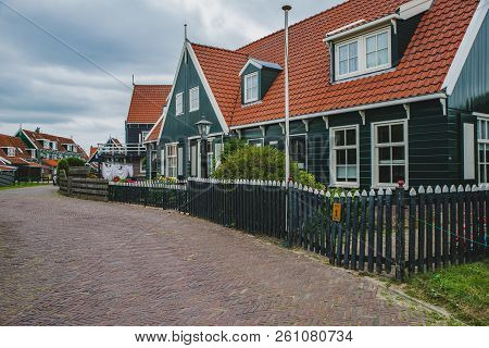 Street Of Dutch Village With Wooden Houses In Marken, A Touristic Place Of  Waterland, Island In The