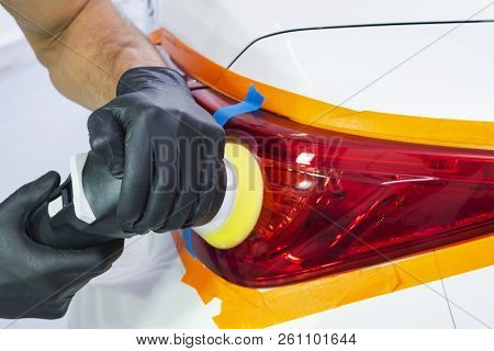 Car Polish Wax Worker Hands Holding Polisher And Polish. Close Up At Hand Holding Car Polisher. Man 