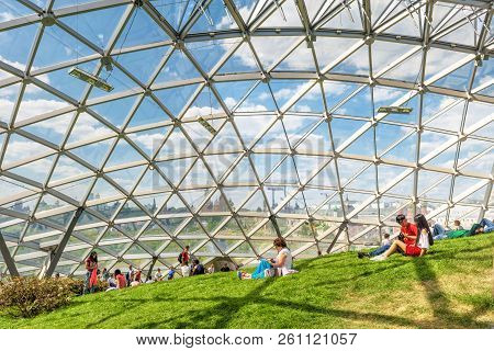 Moscow - June 17, 2018: People Relax In A New Amphitheater With Glass Roof In Zaryadye Park In Mosco