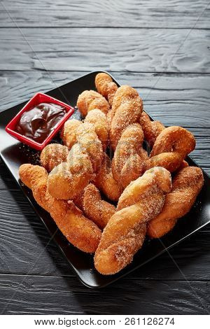 Homemade Twisted Korean Doughnuts - Kkwabaegi Sprinkled With Sugar And Served With With Chocolate Sa