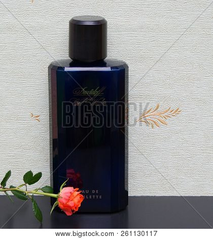 Davidoff Cool Water, Eau De Toilette, Large Perfume Bottle In Front Of The Satin Wallcovering Elysee