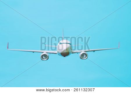 White Airplane On A Blue Background, Front View