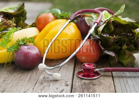 Sthetoscope And Fresh Colorful Vegetables Ingredients Fo Vegan And Healthy Cooking Or Salad Making O