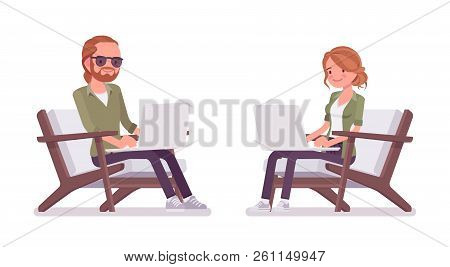 Young Red-haired Man And Woman Sitting And Resting, Working With Laptop. Caucasian Boy And Girl With