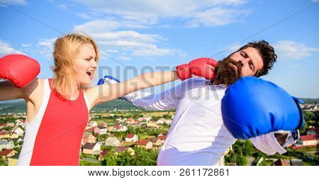 Couple Boxing Gloves Fight Sky Background. Henpecked Guy Attacked By Wife. Girl Confident Strength P