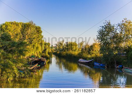 Pier And Fishing Boats In 