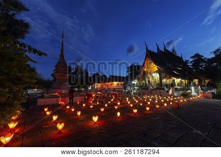 Lanterns Lit Up In Front Of The Main Temple At Wat Xiengthong For The End Of Buddhist Lent.