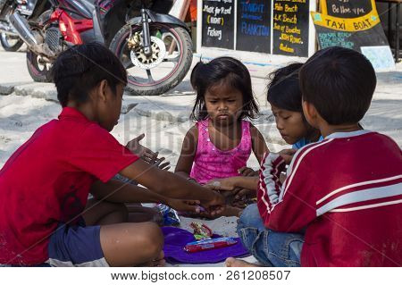Koh Rong Island, Cambodia - April 7, 2018: Khmer Children On Village Street. Playing Kids With Emoti