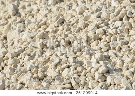 Breakstone background. Road gravel. Gravel texture. Crushed Gravel background. Piles of limestone ro