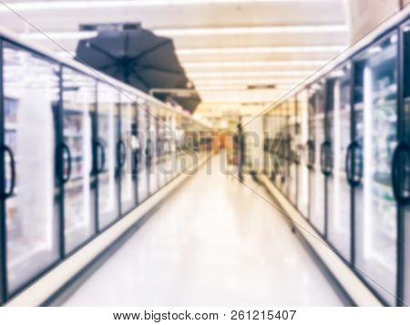 Blurry Background Customer At Frozen Food Section At Grocery Store In America