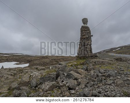 Iceland, West Fjords, Isafjordur, June 25, 2018: Big Kleifabui Statue Made From Natural Stones At Kl