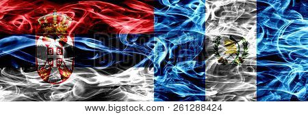 Serbia Vs Guatemala, Guatemalan Smoke Flags Placed Side By Side. Thick Colored Silky Smoke Flags Of 