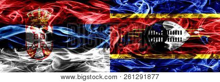 Serbia Vs Swaziland, Swazi Smoke Flags Placed Side By Side. Thick Colored Silky Smoke Flags Of Serbi