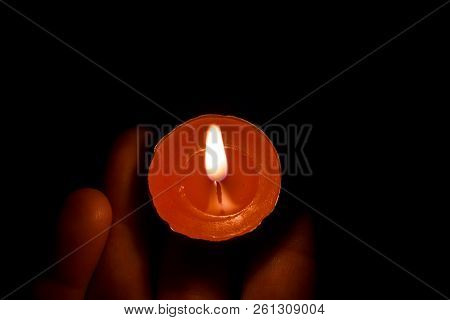 Burning Candle On The Palm, Close Up