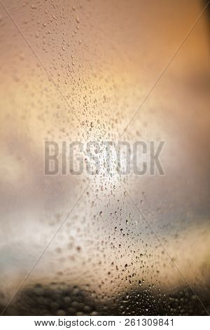 Drops Of The Rain On The Window Glass. Wet Background