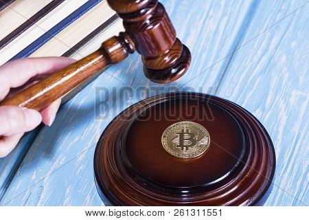 Judge's Hammer And Bitcoin Gold Coin. Digital Currency.