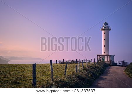 Lighthouse Of Lastres Lluces In Asturias - Spain