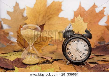 Daylight Saving Time. Wall Clock Going To Winter Time. Autumn Abstraction.