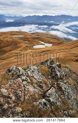 Caucasus Mountains. Koruldi - lake in Svaneti, Georgia. Cloudy autumn day