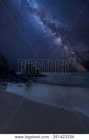 Stunning Vibrant Milky Way Composite Image Over Landscape Of Barafundle Bay On Pembrokeshire Coast I