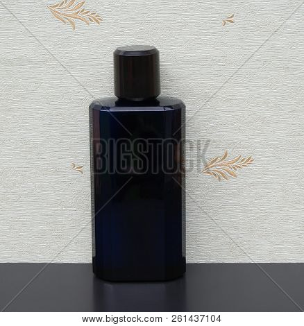 Eau De Toilette, Large Perfume Bottle In Front Of The Satin Wallcovering Elysee