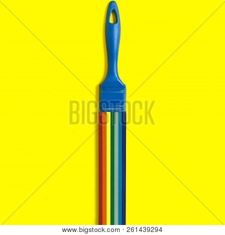 Brush With Swirling Rainbow Strips For Quilling. Artificial Object That Mimics Natural Shapes. Yello