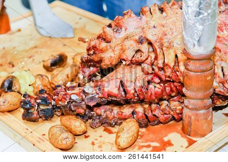Roasted Meat Over An Open Fire, Cooked In A Special Way.barbecue Is Prepared Of Lamb Or Sheep Meat A