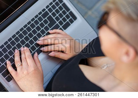Sexually Female Hands Typing On A Laptop Keyboard Close Up, Outdoors. Freelancer Works, Looking For 