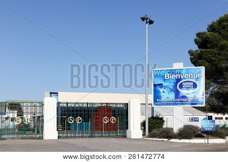 Vergeze, France - July 1, 2018: Entrance Of Source Perrier Factory In France. Perrier Is A French Br
