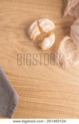 Coockies With Egg White Cover. Portuguese Sweets Known As Cavacas On Napkin In A Table.
