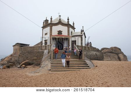 Vila Nova De Gaia, Portugal - September 30, 2018 : Pilgrims Visit The Chapel On Foggy Days By The Se
