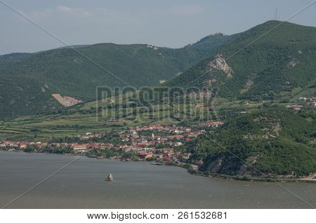 Panorama Of Danube River On Border Between Serbia And Romania, With Baba Caia Rock And Coronini Town