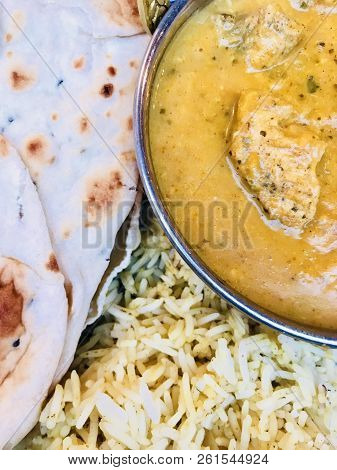 Chicken Korma With Rice And Naan Bread