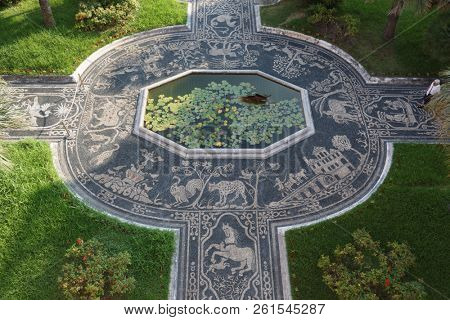 GENOA, ITALY - AUGUST 5, 2018: People on pebble mosaics at the Palazzo Reale. Built in 17th century, since 2006 the Palace is listed as UNESCO World Heritage site