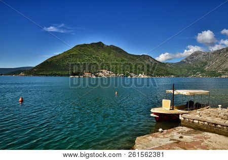 Perast is an old and little town on the Bay of Kotor in Montenegro. It is situated a few kilometres of Kotor and is noted for its proximity to the islets of St. George and Our Lady of the Rocks.