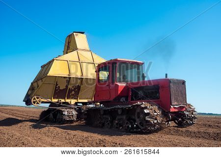 Special Equipment For Collecting Peat. Peat Extraction Process. Agriculture Industry, Peat Farm. Red