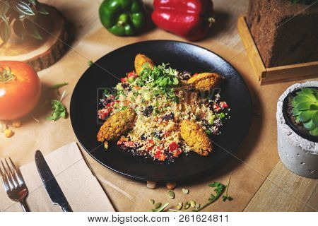 Maroccan Couscous And Falafel Dish On The Table