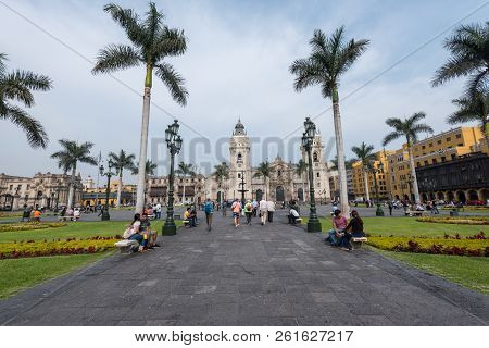 Lima, Peru--april 12, 2018. Tourists, Pedestrians And Residents In The Plaza Mayor, The Center Of Th