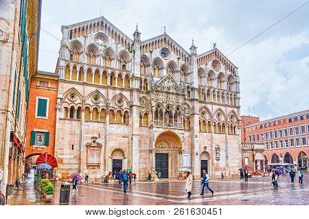 Ferrara, Italy - April 30, 2013: The Doumo Of Ferara Has The Most Beautiful Frontage Among Othe Chur